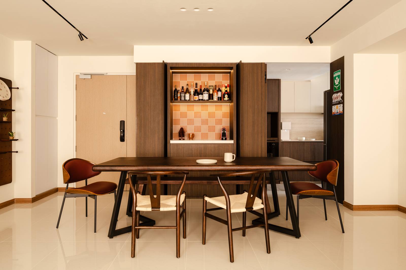 The dining room at 961C Tampines, seen along the walnut wall